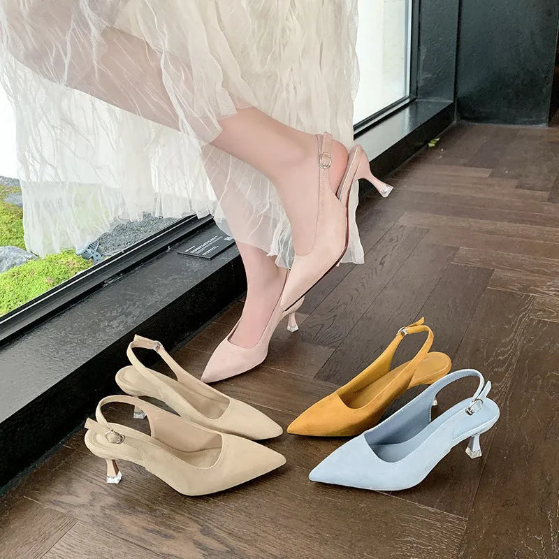 Apricot suede women's pointed-toe stiletto high heels on a plain background.