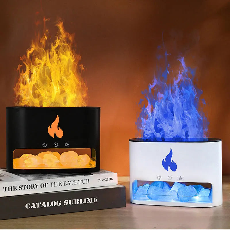 White square flame humidifier with colourful 3D light effect and crystal salt stone on a desk.