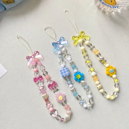 Beaded flower mobile phone lanyard with blue resin flowers on adjustable 120cm cord and secure clasp