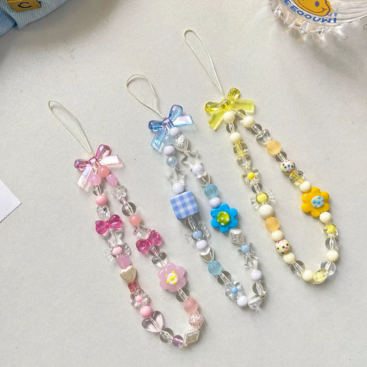 Beaded flower mobile phone lanyard with blue resin flowers on adjustable 120cm cord and secure clasp