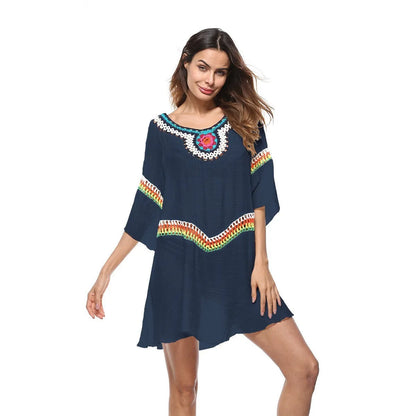 Women's crocheted ethnic style beach cover-up top in apricot colour, for sun protection.