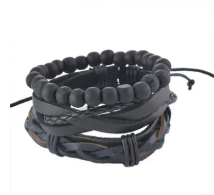 Hand-woven brown leather bracelet with wooden beads and rope detailing on a wrist.