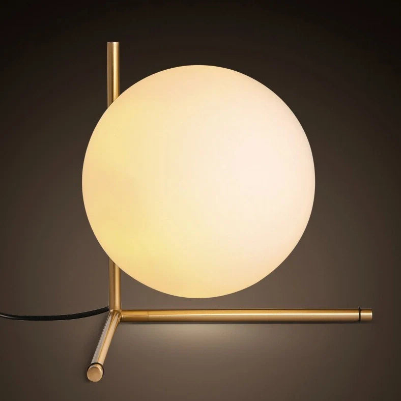 Clear glass spherical table lamp with aluminium base showing dual-colour LED lighting options
