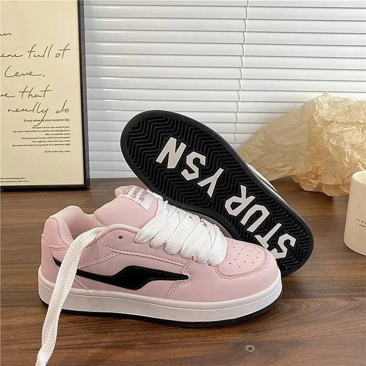 Women's low top board shoes in solid pink, white yellow, white black, or white red with mid heel and rubber sole