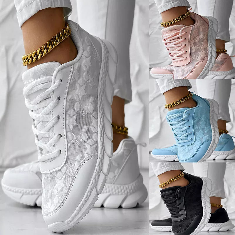 Women's lightweight canvas running shoes in white, black, blue, and pink