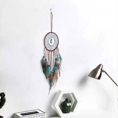 Handmade turquoise dream catcher with feathers and iron ring