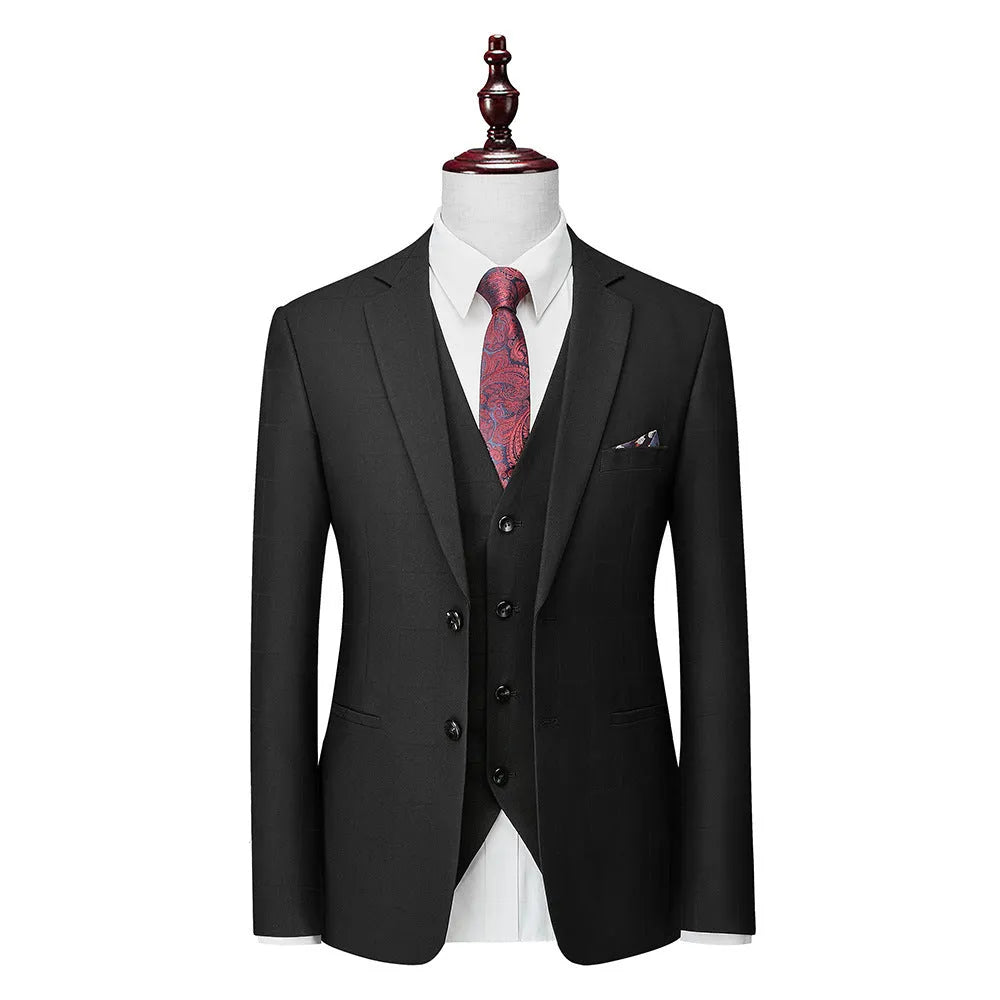 Men's navy blue slim fit three-piece suit with waistcoat on a hanger