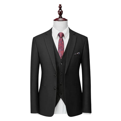 Men's navy blue slim fit three-piece suit with waistcoat on a hanger