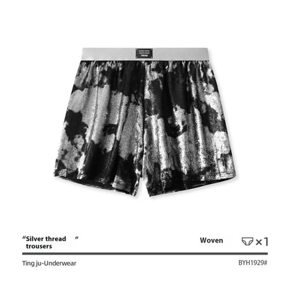 Men's reflective bright silver casual woven underwear with a loose fit and mid-waist.