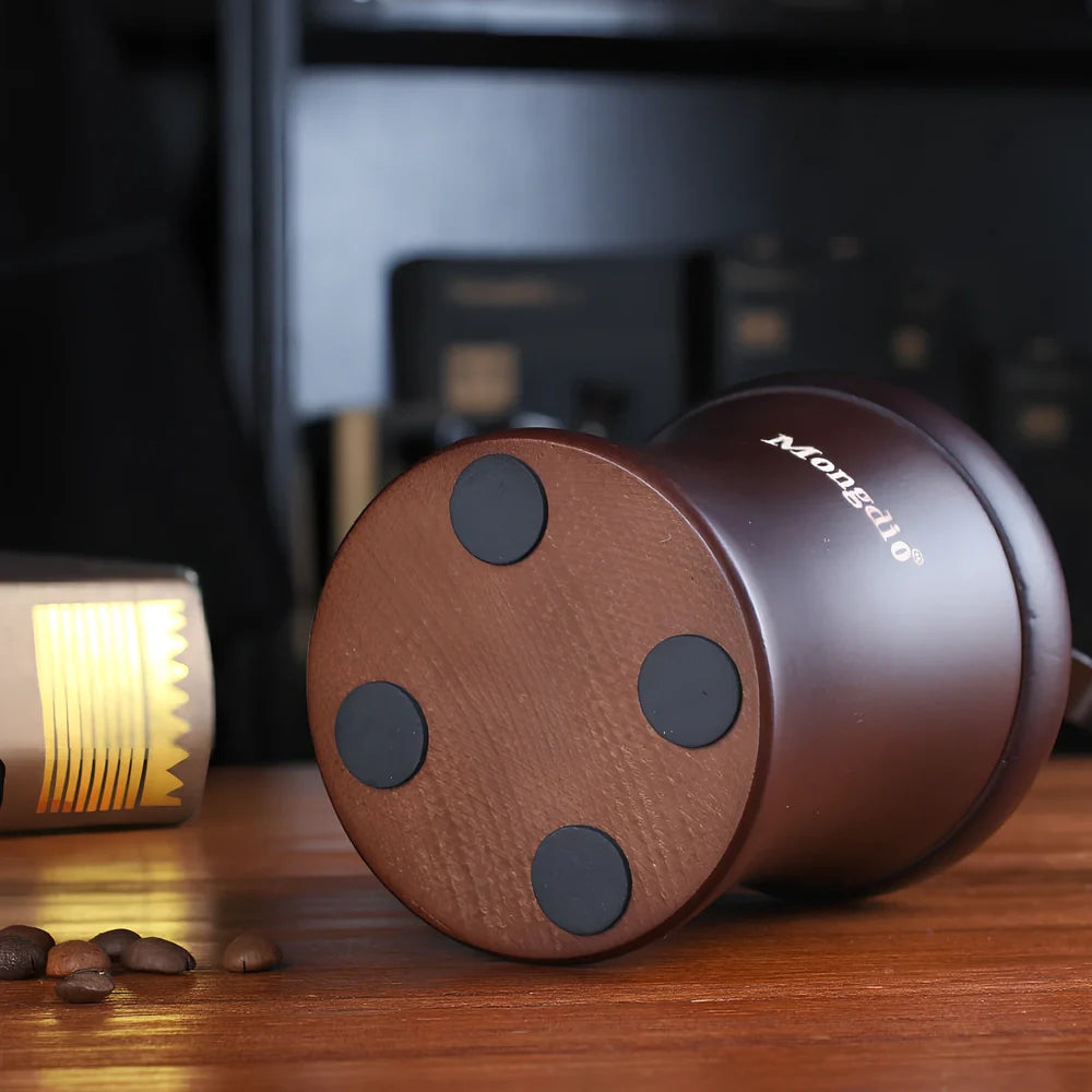 Manual coffee grinder with solid wood barrel and ceramic burrs for precise grinding control