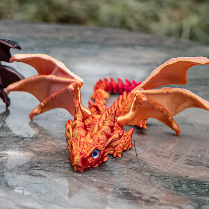 Red and gold 3D printed plastic dragon wings decoration for costumes.