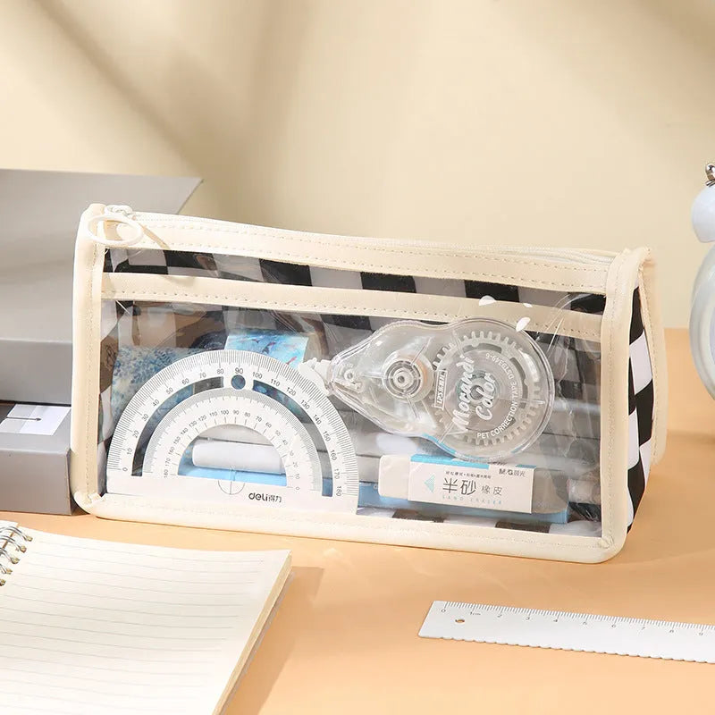 Chessboard pattern transparent PVC pencil case showing 21.5cm length with stationery items visible inside