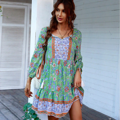 Boho print button V-neck long sleeve fringe dress in vibrant colors