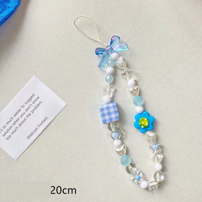 Beaded flower mobile phone lanyard with blue resin flowers on adjustable 120cm cord and secure clasp