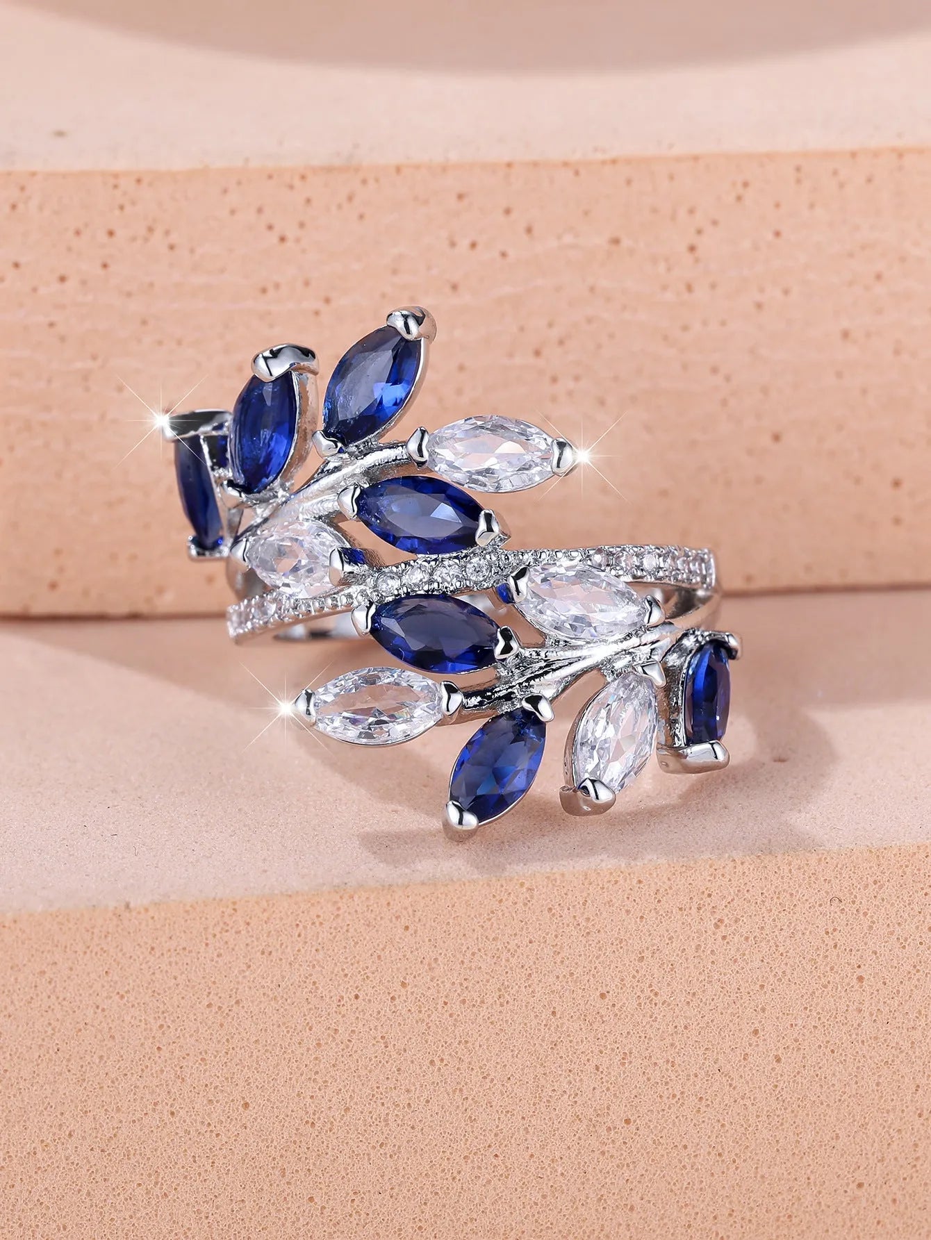 Horse Eye Zircon Leaf Ring with adjustable opening in rose gold purple white diamond colour on a hand
