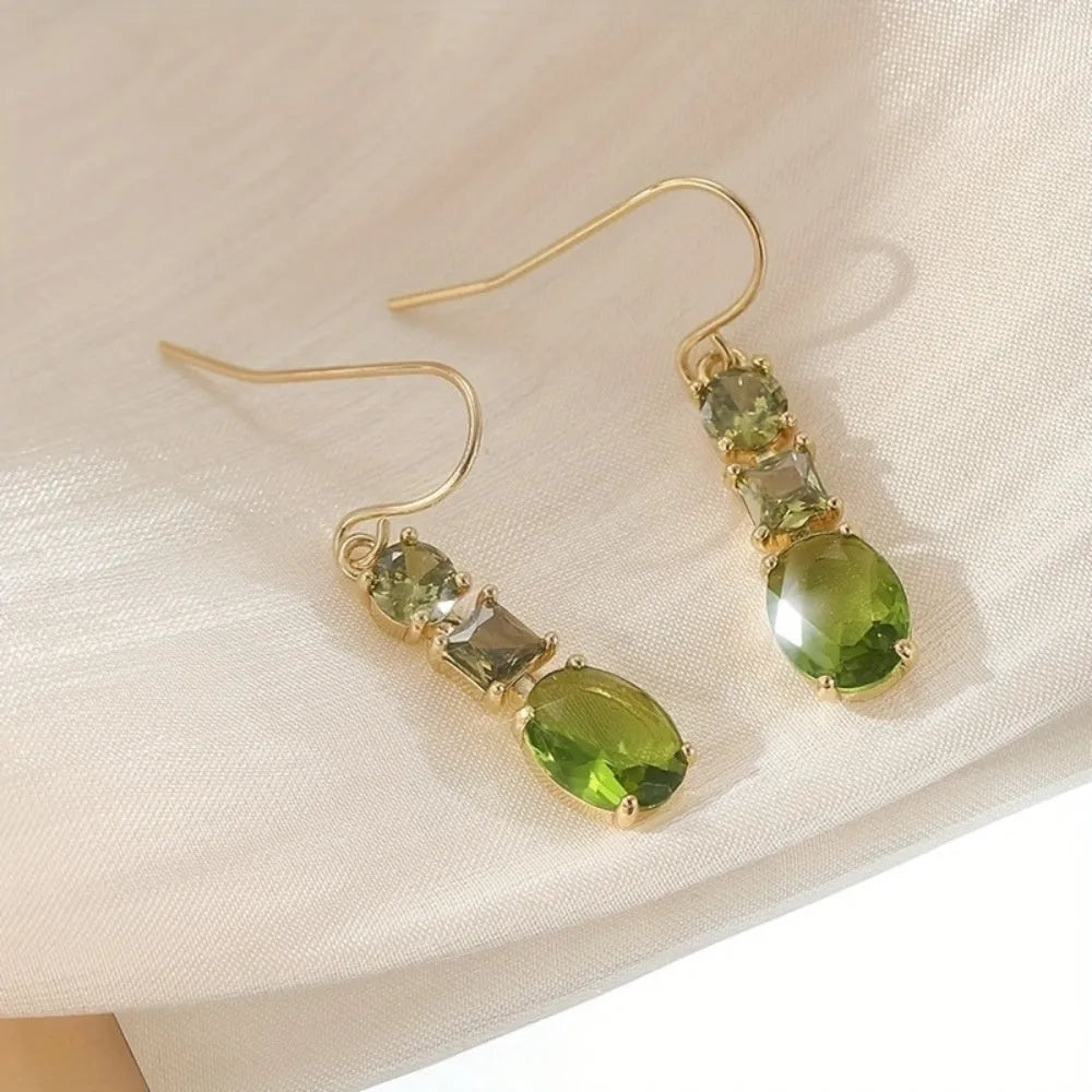 Green geometric copper earrings with a quadrilateral shape in a retro bohemian style