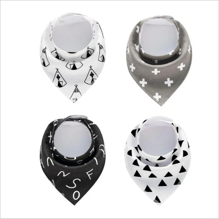 Stylish baby bibs and burp cloths featuring trendy arrow, wave, and triangle designs in soft, absorbent cotton