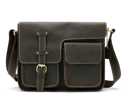 Leather vintage messenger bag in black with adjustable crossbody strap and brass buckle