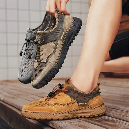 Men's brown suede casual tennis shoes with elastic band closure and hand-stitched rubber sole.