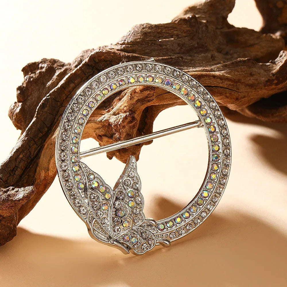 Bow-shaped waist-cinching accessory clip for high-end brooches, alloy with electroplating and diamond inlay, shown in gold, silver, or rose gold finishes.