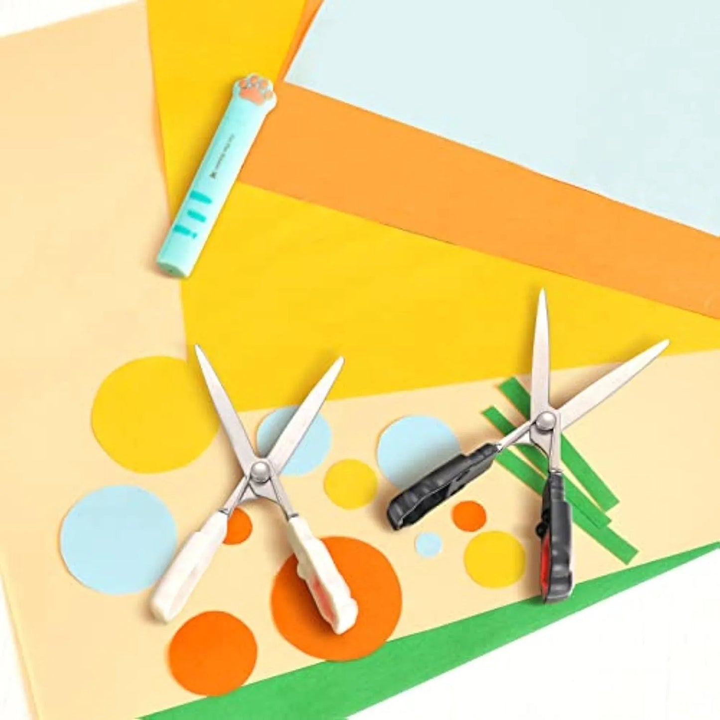 Closed and open views of cat paw mini folding scissors showing stainless steel blades and coloured handles.