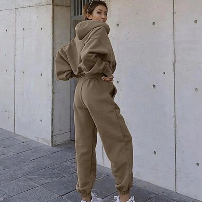 Women's casual hoodie outfit in various colors and sizes, featuring a stylish design and comfortable polyester construction.