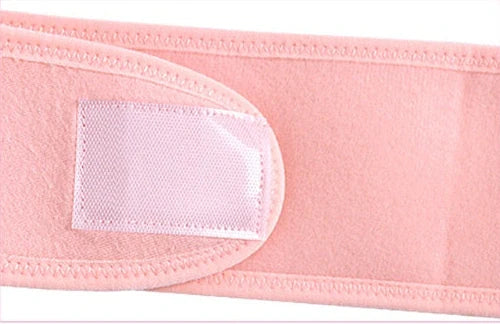 Pink maternity support belt with stomach lift function showing adjustable length up to 164cm