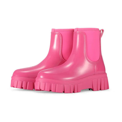 PVC low tube rain boots in apricot colour with non-slip sole and flat heel design