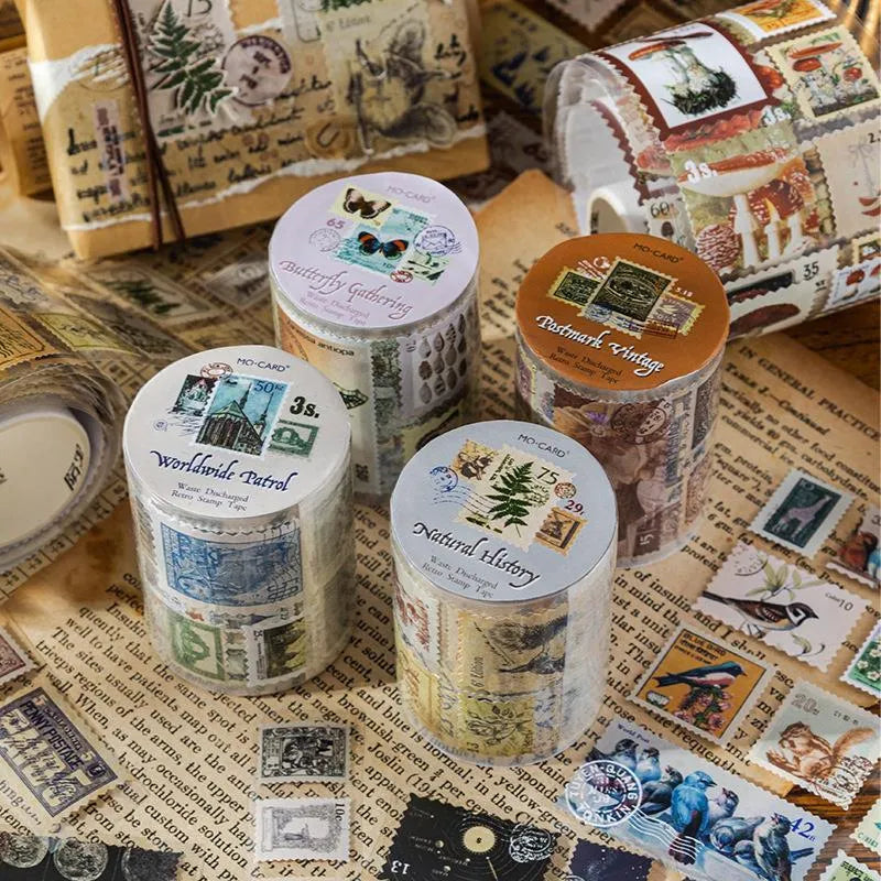 Roll of 55mm wide coated paper stamp decoration with repositionable adhesive backing for DIY journals and crafts