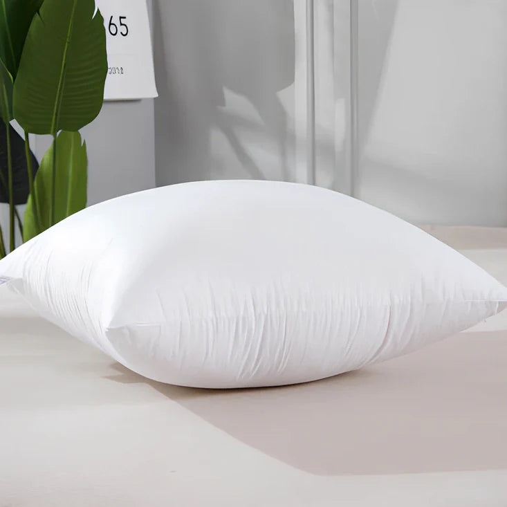 White cotton throw pillow with detachable cover in 18-inch square size with weather-resistant properties