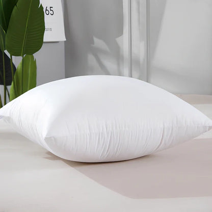 White cotton throw pillow with detachable cover in 18-inch square size with weather-resistant properties