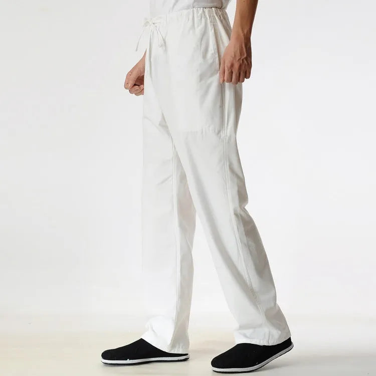 Men's beige pure cotton casual trousers with a drawstring waist on a mid-grey background.
