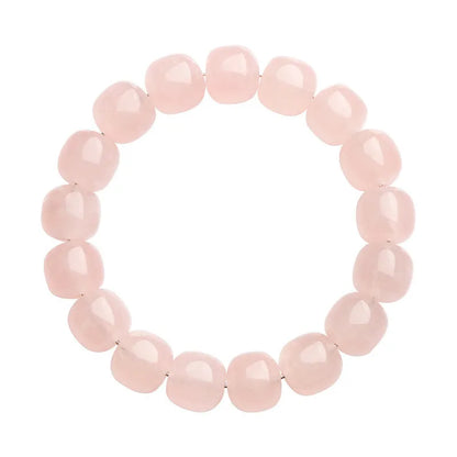 Pink crystal barrel bead bracelet with geometric design measuring 11-12mm beads on wrist