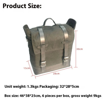 Black waterproof canvas motorcycle side bag with cowhide accents showing mounting straps