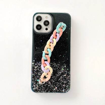 Silicone soft cover phone case with bracelet starry design in transparent, black, pink, or green for iPhone 14 and 15