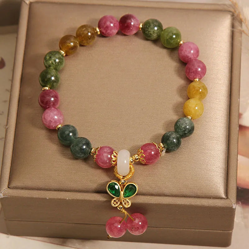 Women's tourmaline butterfly pendant bracelet with colourful stone details and rhinestone elements
