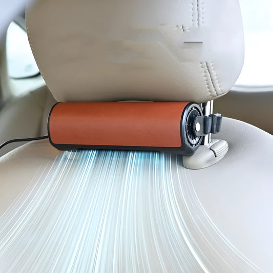 Black bladeless car-mounted fan with USB power cord on a car headrest.