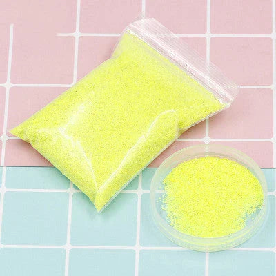 Magical self-adhesive space sand in various colors, allowing for endless creative sculpting and molding even when submerged in water