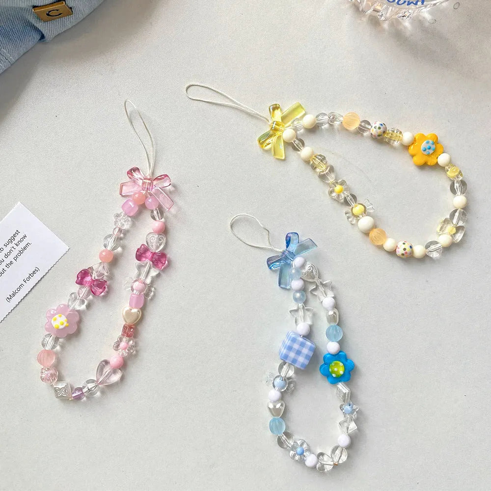 Beaded flower mobile phone lanyard with blue resin flowers on adjustable 120cm cord and secure clasp