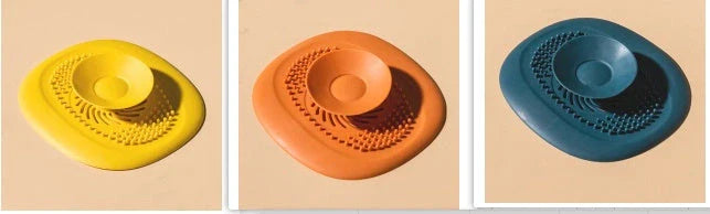 TPR vortex design sink drain cover in twilight orange, quiet blue, mango yellow, and gentian green