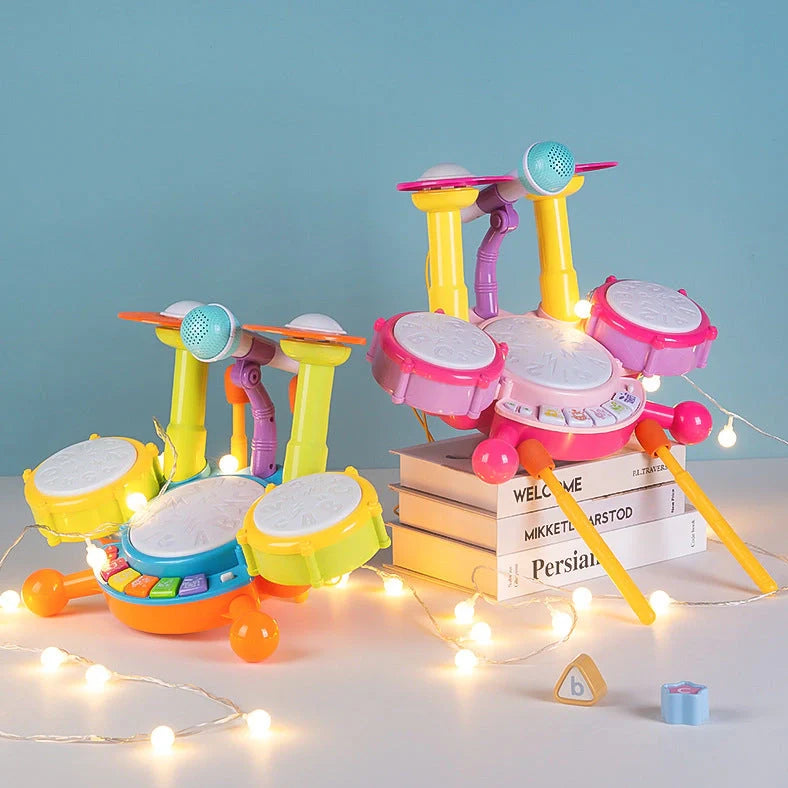 Yellow plastic children's hand-tapping drum toy with electronic sound activation