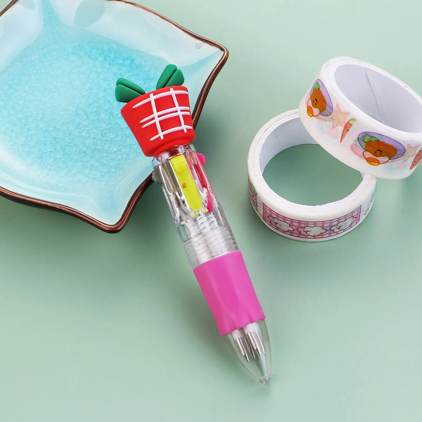 Christmas four-colour ballpoint pen with press mechanism showing festive designs