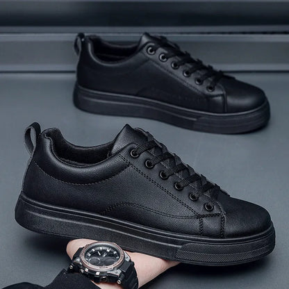 Men's low top casual sneakers in Korean style, shown in black, white, and two-tone colour options on a rubber sole.