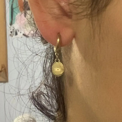 Geometric stainless steel earrings with ellipse design and ear button fastening, approximately 2-3cm diameter