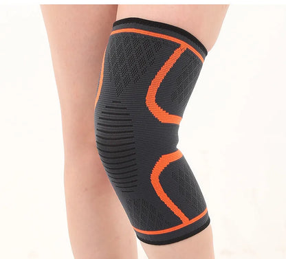 Black non-slip stretch sports knee pad shown on a knee, with size and colour options visible.