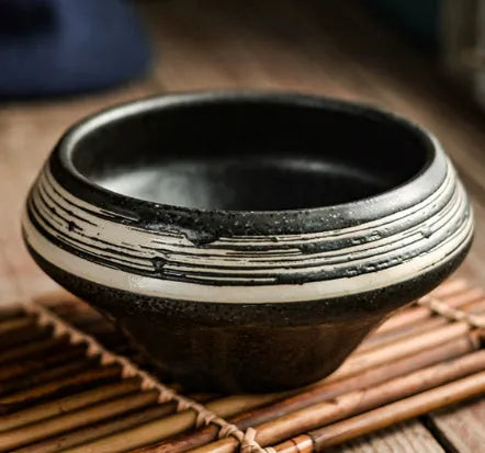 A tall porcelain soup bowl with a Japanese-inspired underglaze pattern, suitable for noodles and microwave use.