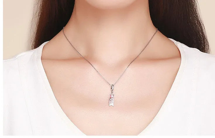 S925 sterling silver carp streamer pendant with zircon accents measuring 28mm tall