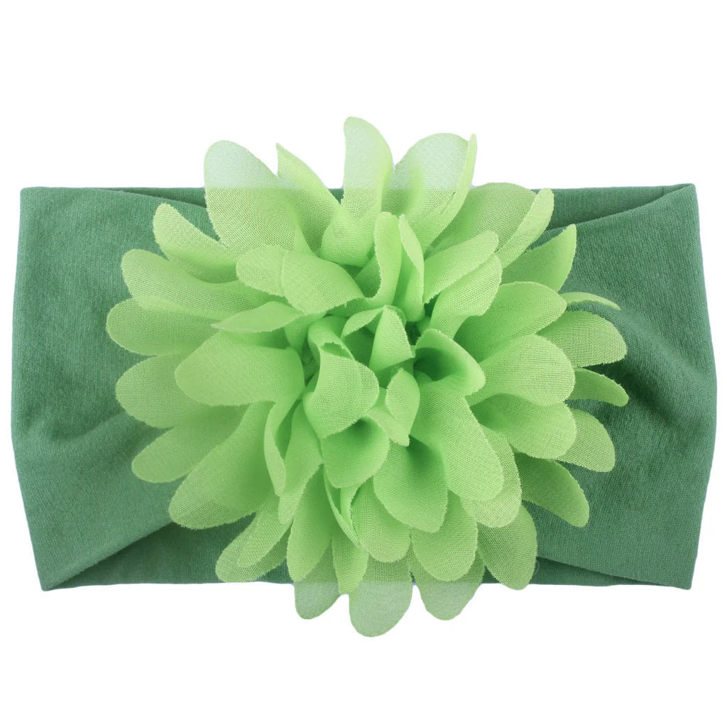 Adorable chiffon flower baby headband for your little princess, available in multiple colors.