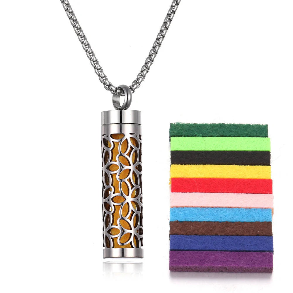 Titanium steel aromatherapy pendant with essential oil diffuser in various color options