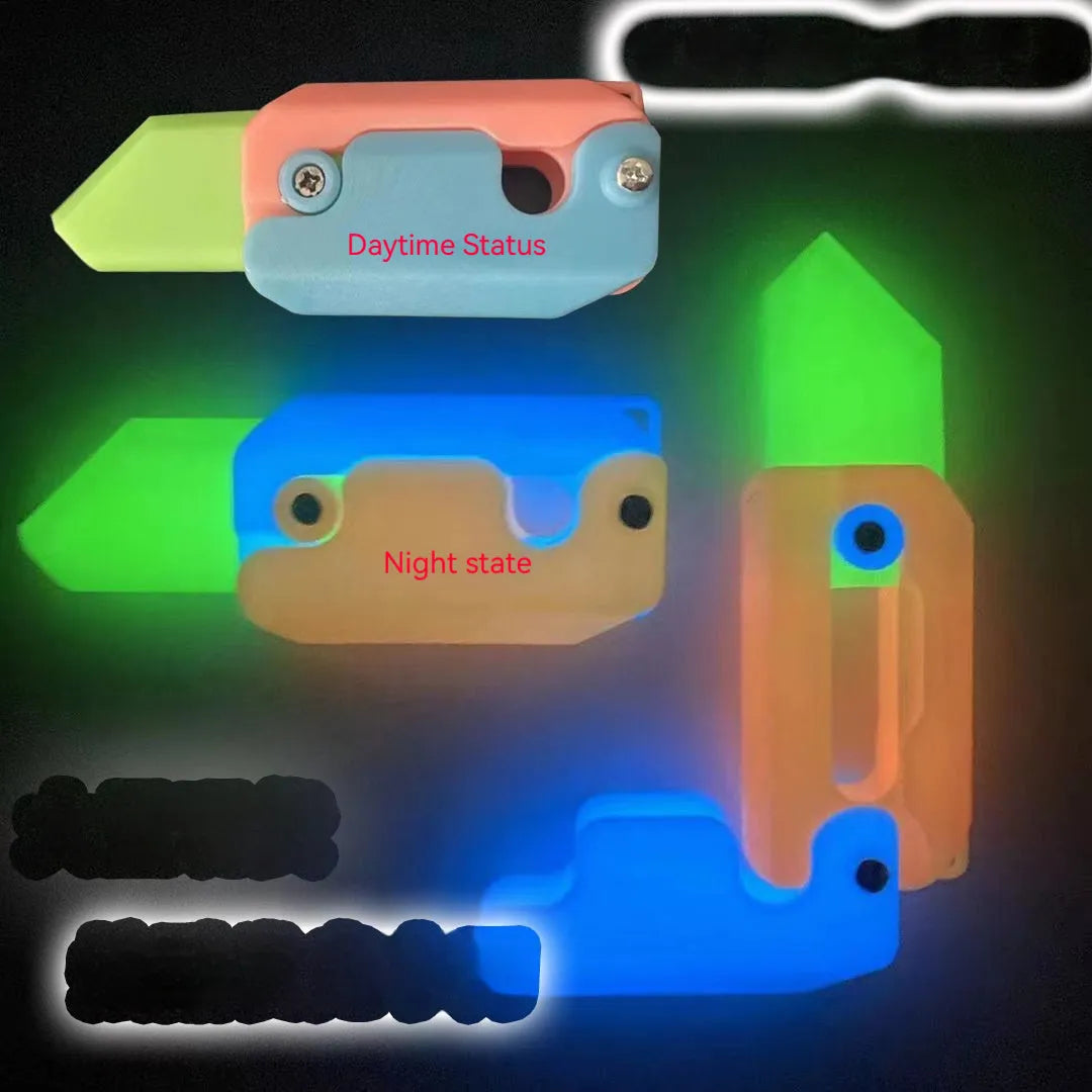 Small orange and green 3D printed plastic carrot knife fidget toy with blade extended.